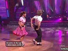 Mesmerizing Celebrity Brooke Burke Dancing In a Retro Fifties Outfit